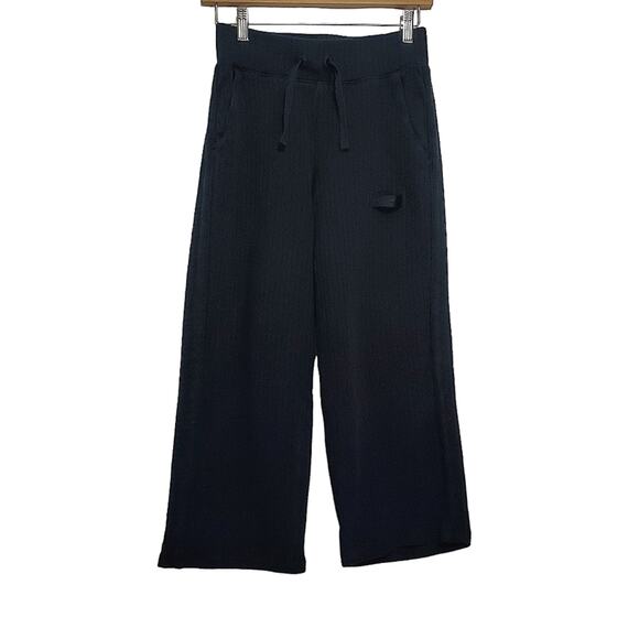 Nike | Ribbed Wide Leg Cropped Athletic Knit Pants with Pockets and Drawstring - Picture 2 of 16